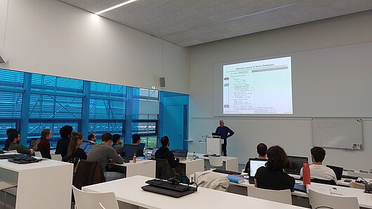 course room with teacher and participants