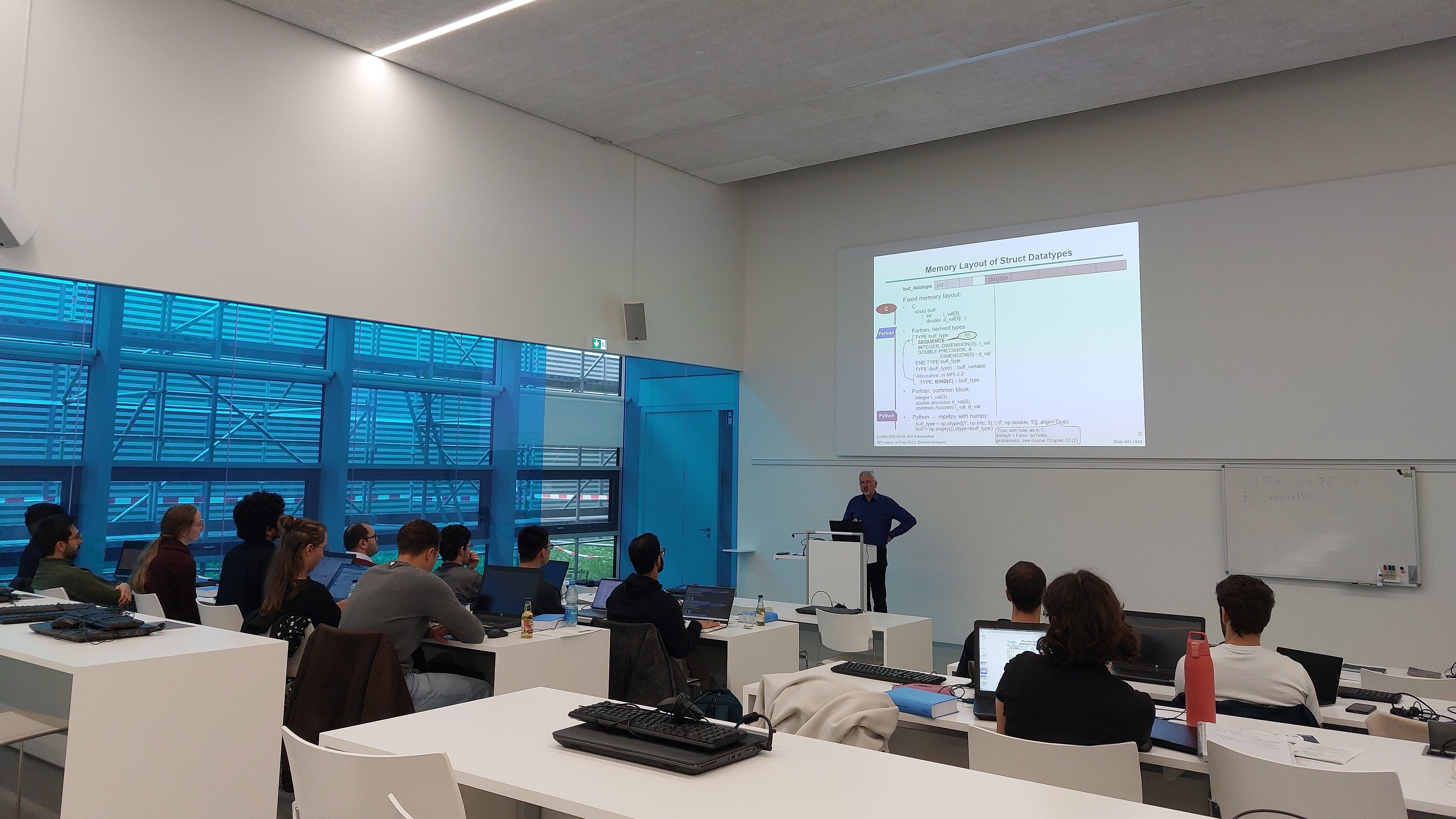 course room with teacher and participants course room with teacher and participants