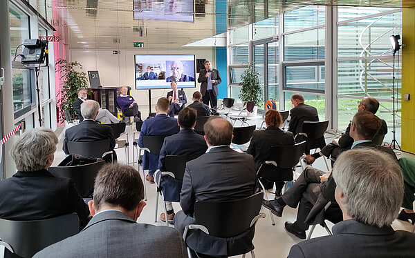 Photo of panel discussion and crowd at HLRS anniversary celebration