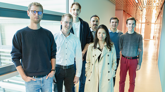 Group photo of seven members of the future computing group, in a corridor at HLRS.