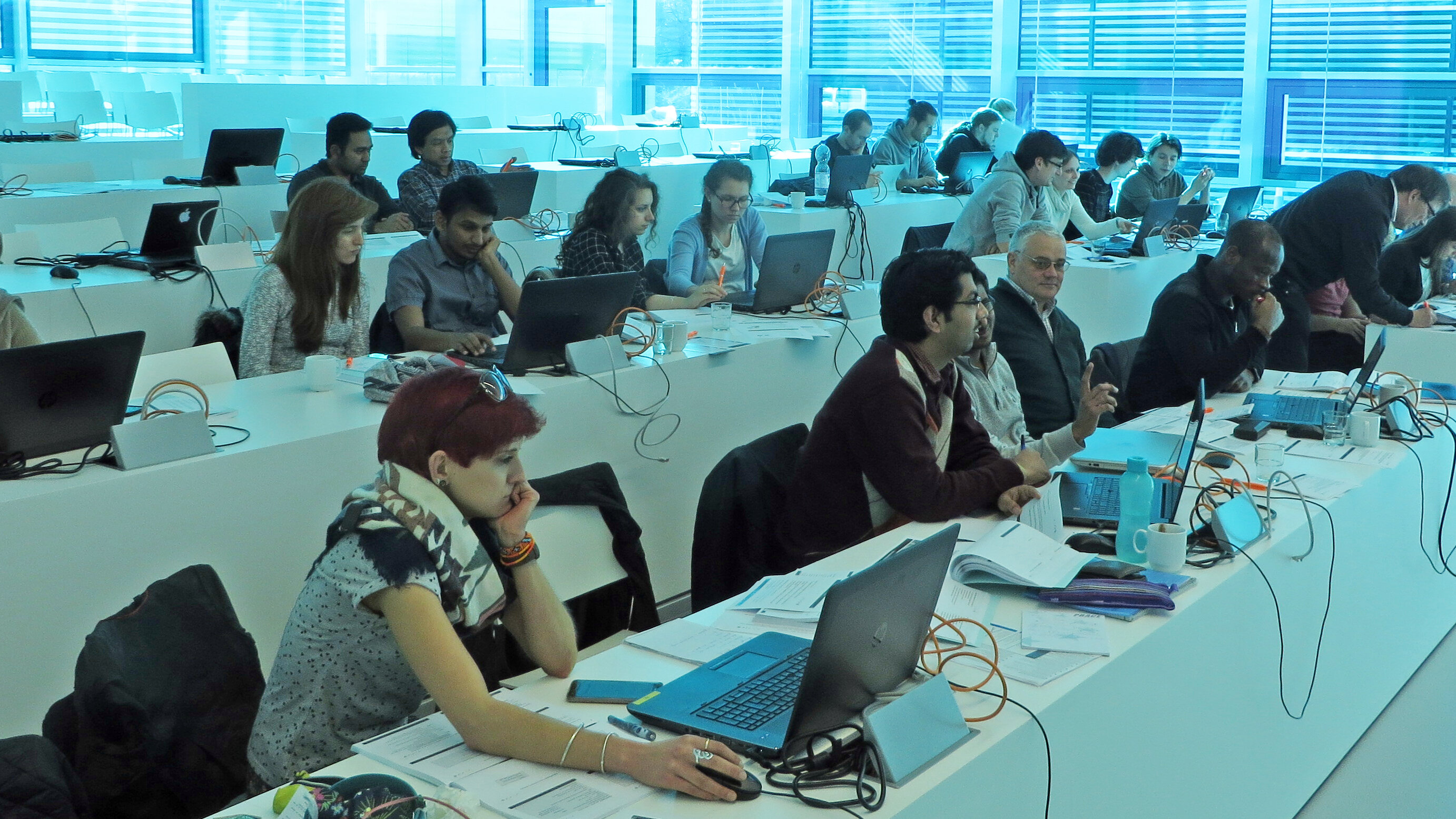 Photo of scientists participating in a training course in HLRS's Ruehle Saal