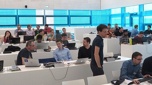 Photo of scientists participating in a training course in HLRS's Ruehle Saal