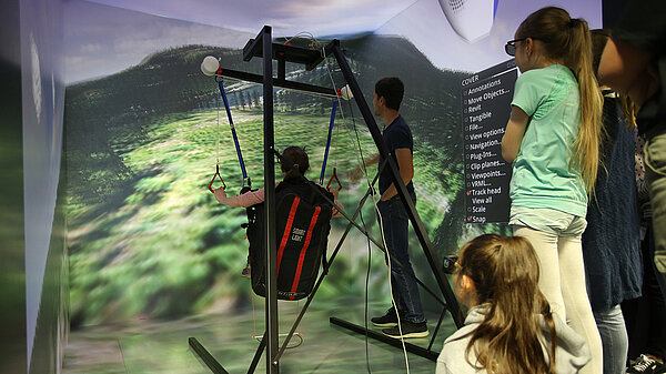 Flying a paraglider in virtual reality in the HLRS CAVE.