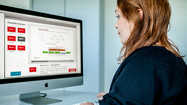 Photo of scientist participating in online course