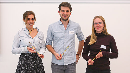 Winners of the 2022 awards hold their Golden Spike Awards.