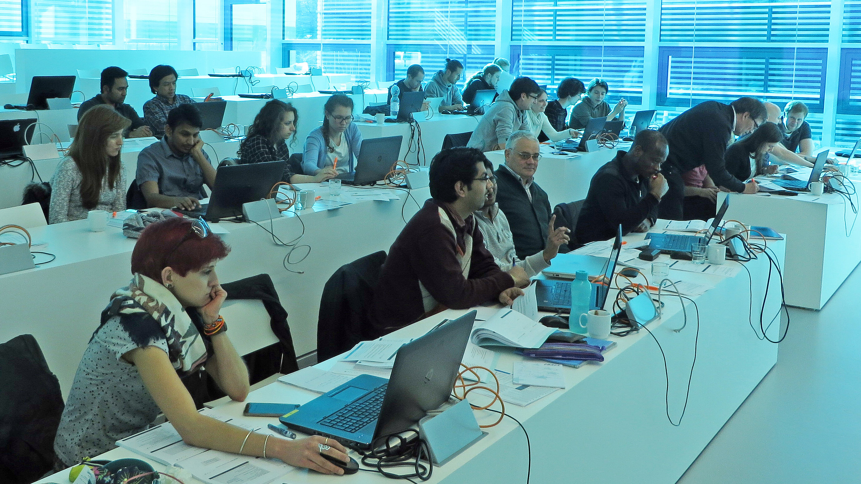 Photo of scientists participating in a training course in HLRS's Ruehle Saal