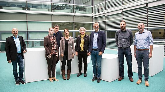 Photo of MSC members in courtyard at HLRS.