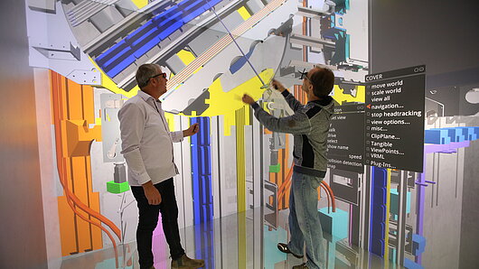 Researchers investigate the function of the MULTI elevator in virtual reality.