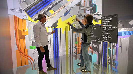 Researchers investigate the function of the MULTI elevator in virtual reality.