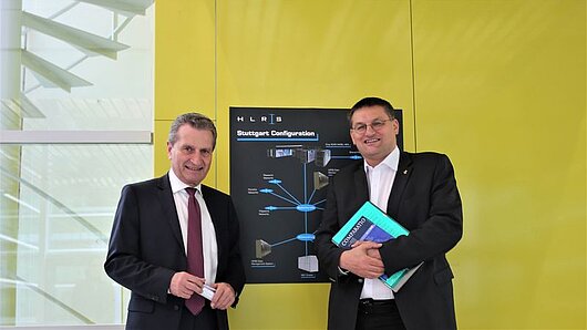Photo of Günther Oettinger and Michael Resch outside the HLRS computing room.