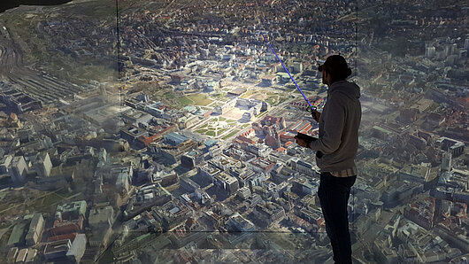 Image of CAVE visualization of Stuttgart's digital twin