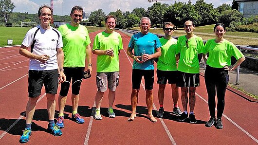 Photo of HLRS runners on race track.